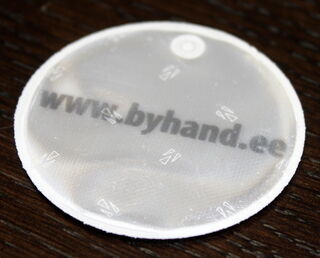 Pyöreä heijastin logolla Byhand